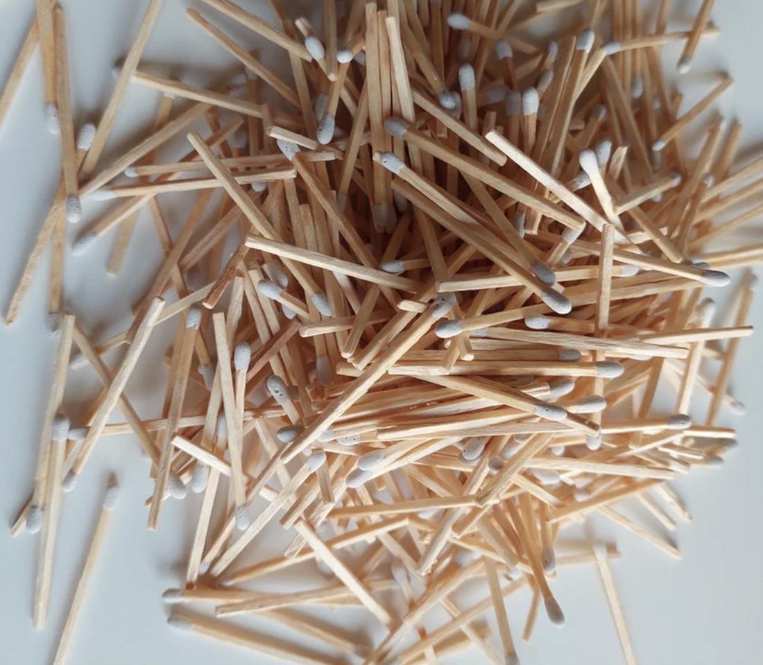 A loose pile of hand-rolled matches